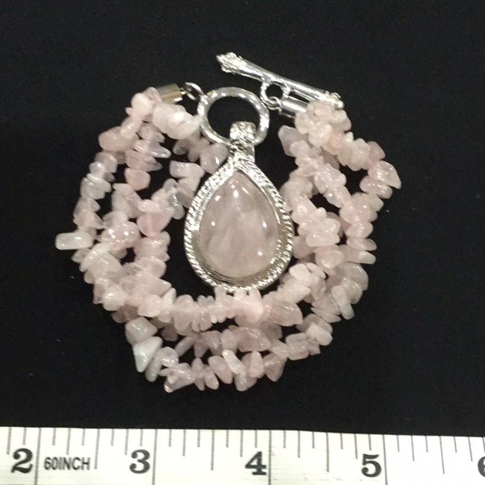 Pink quartz bracelet with charm